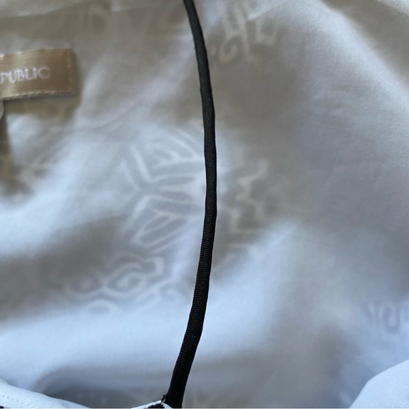 Banana Republic chiffon tank, size 0. Cute “string” sleeves.  Black/cream design - Picture 3 of 6